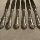 12 stainless steel knives. vintage