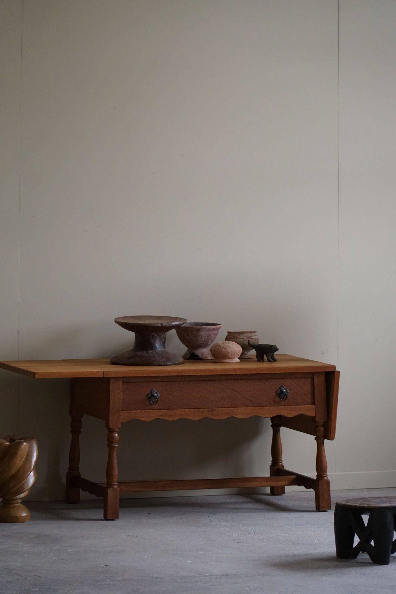 Danish folding table from the mid-century with a drawer in oak, Henning Kjærnulf, 1960s.