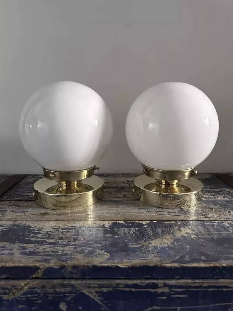 Pair of white opaline globe wall lights