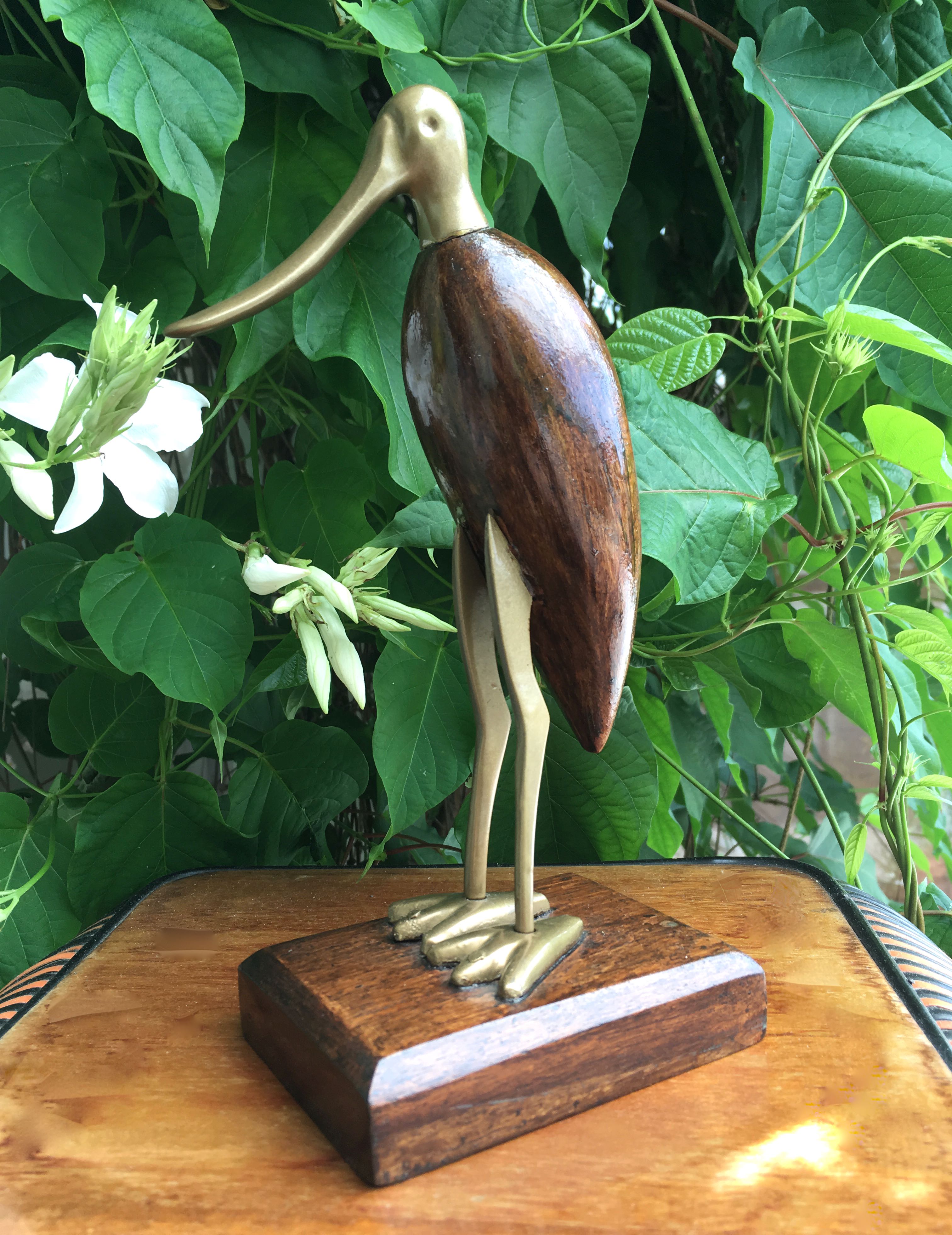 Animal marabout in teak and brass