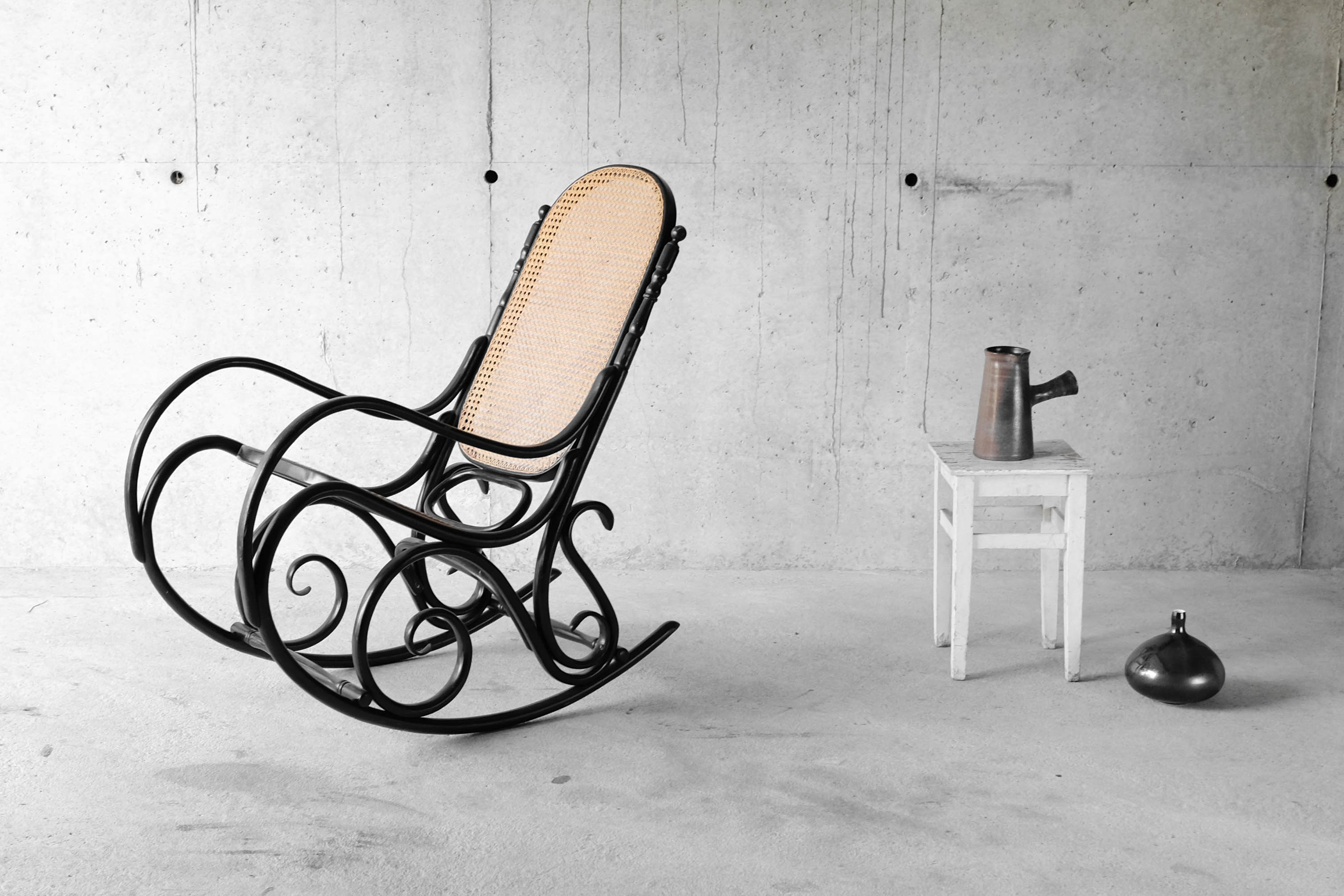 Black rocking chair in curved wood, years 50