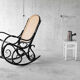 Black rocking chair in curved wood, years 50
