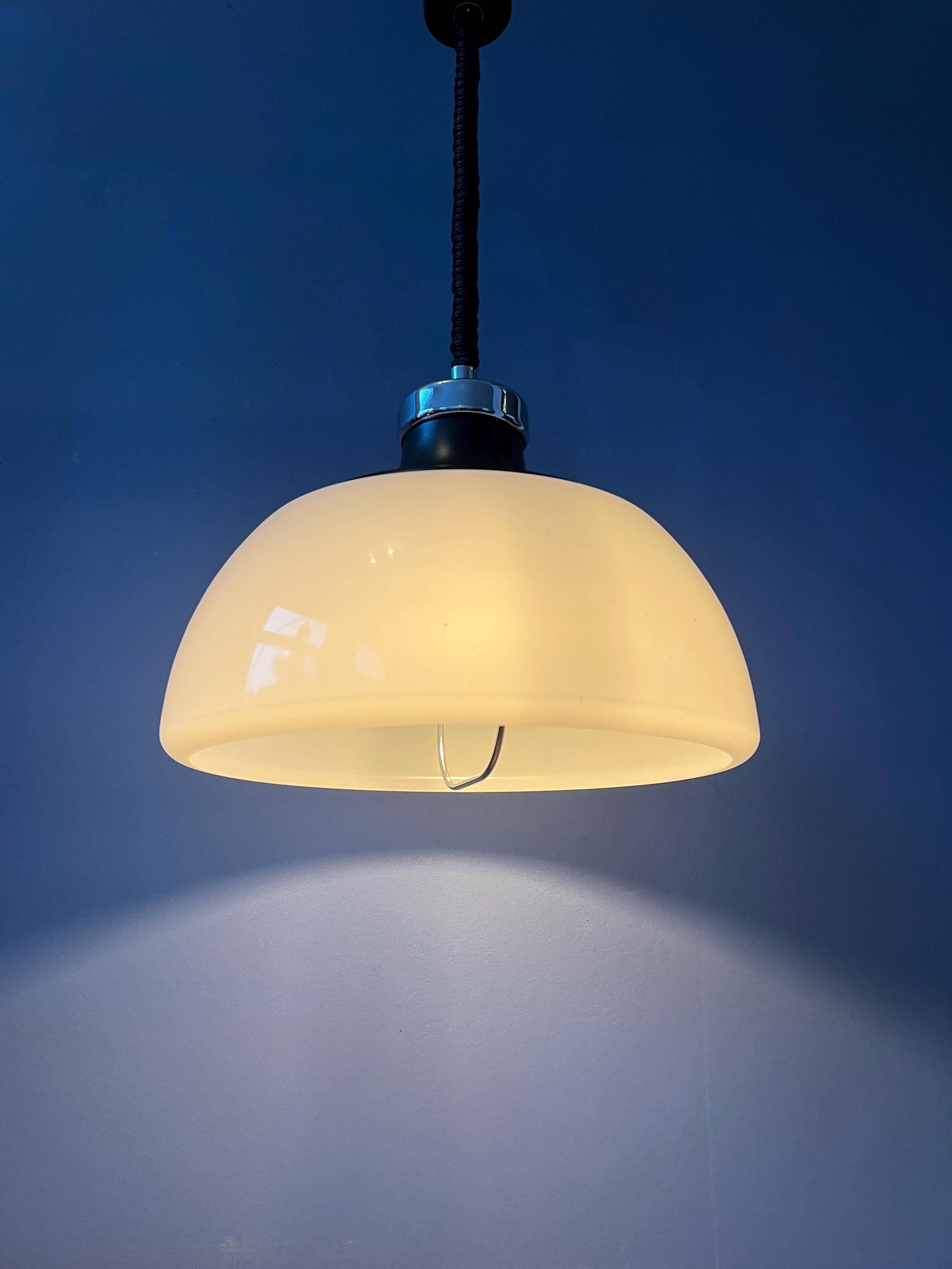 Massive Space Age Mid-Century suspension in plexiglass with white acrylic shade.