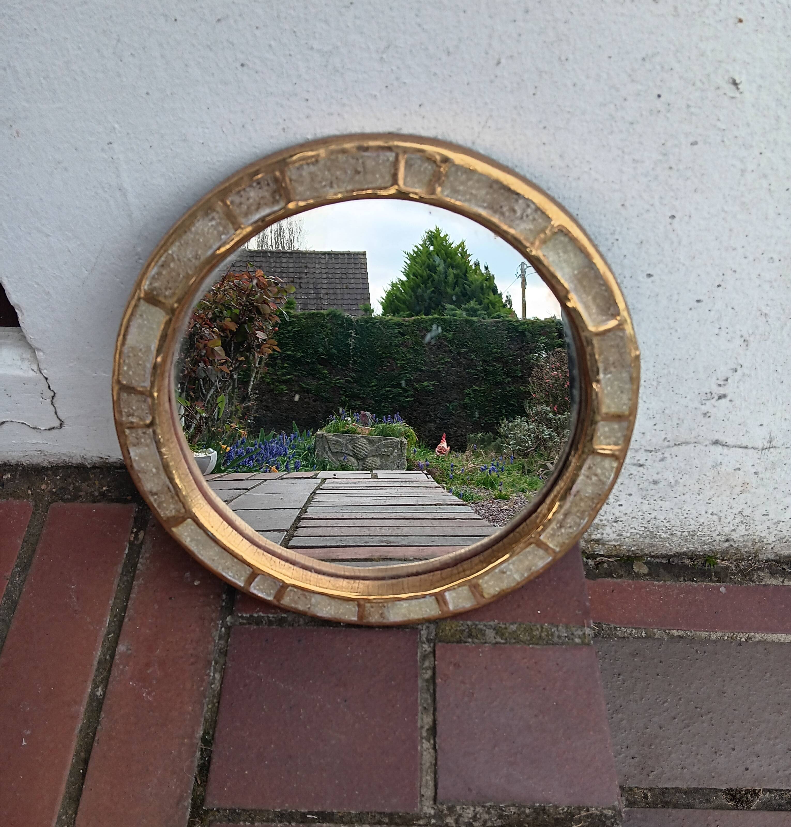 Ceramic mirror "gears" by Mithé Espelt