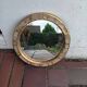 Ceramic mirror "gears" by Mithé Espelt