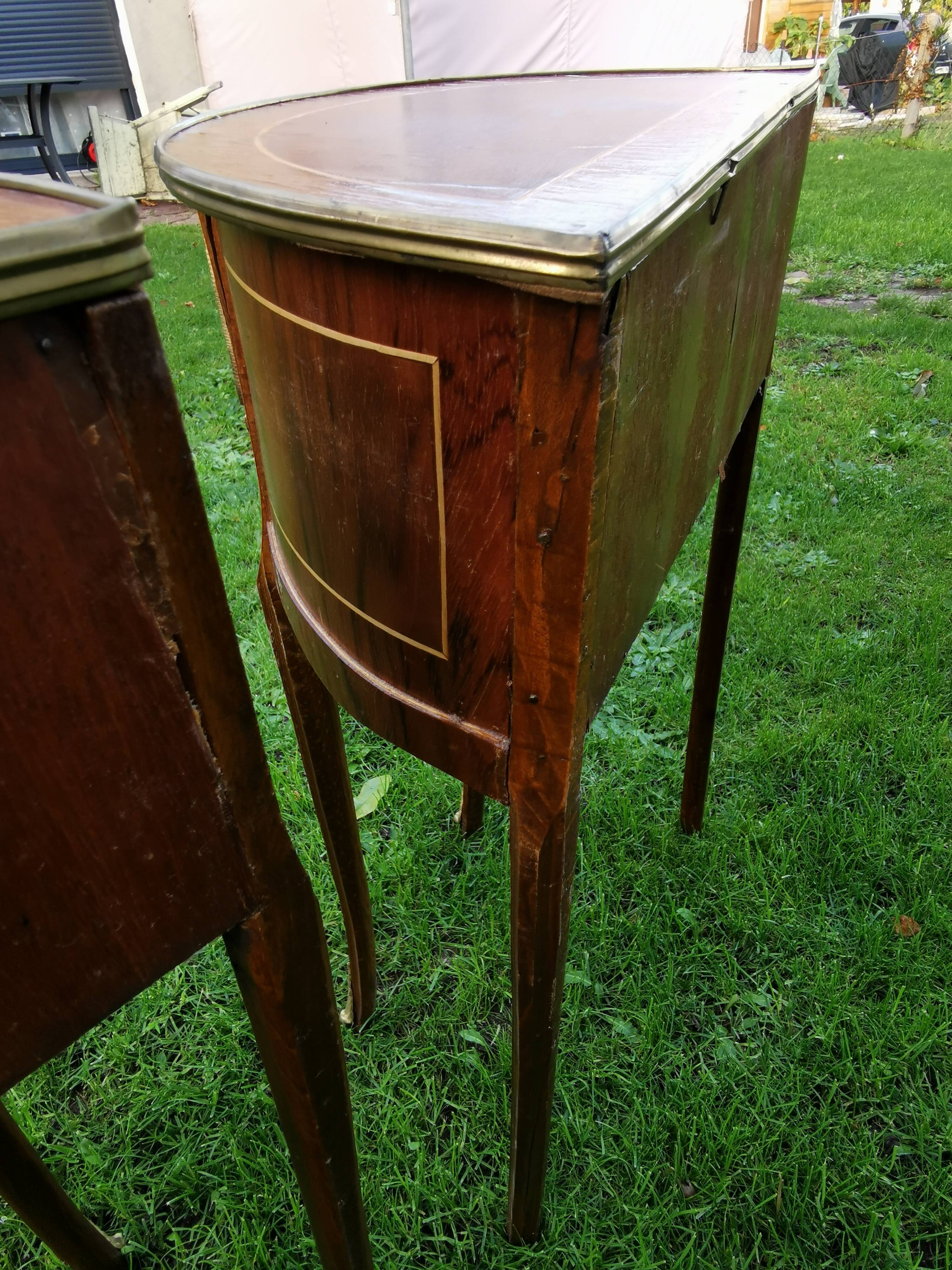 half-moon bedside pair in marquetry, bronze ornaments