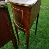 half-moon bedside pair in marquetry, bronze ornaments