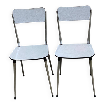 2 beige Formica and steel chairs from the 1980s.