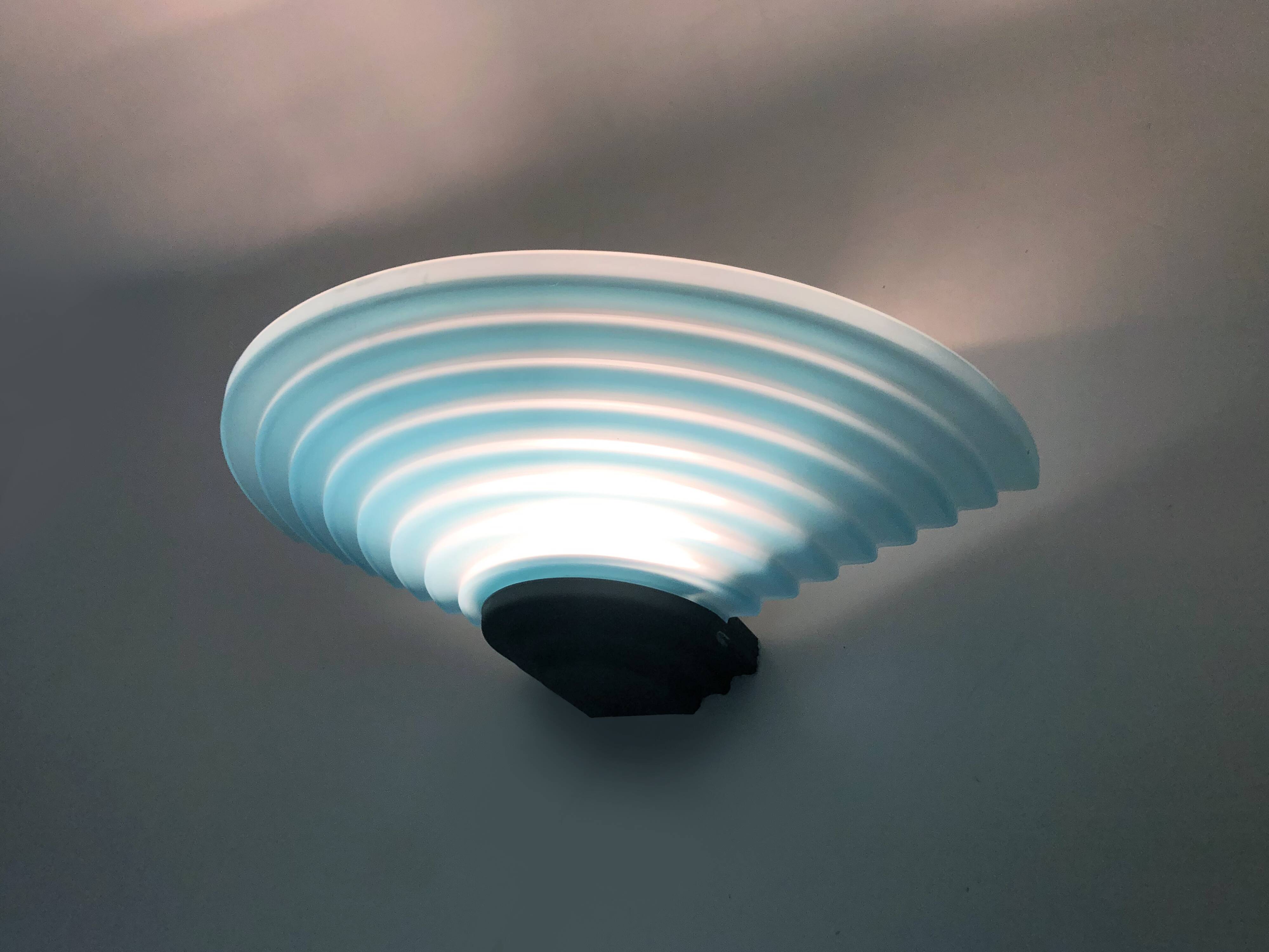 Pair of AV Mazzega wall lights in blue Murano glass. 1980s