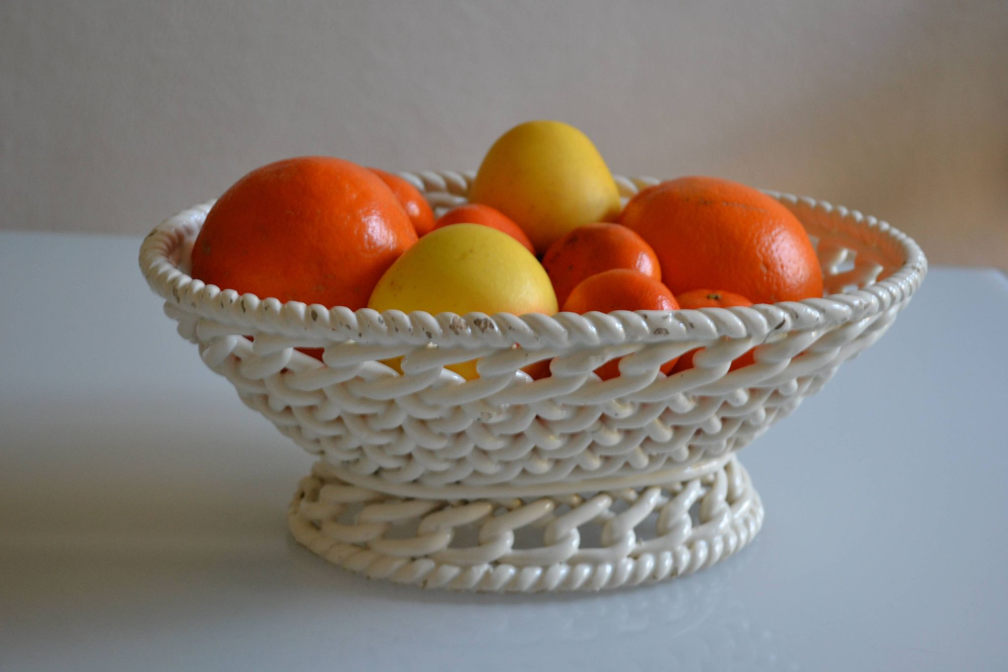 Woven ceramic oval fruit bowl or dish