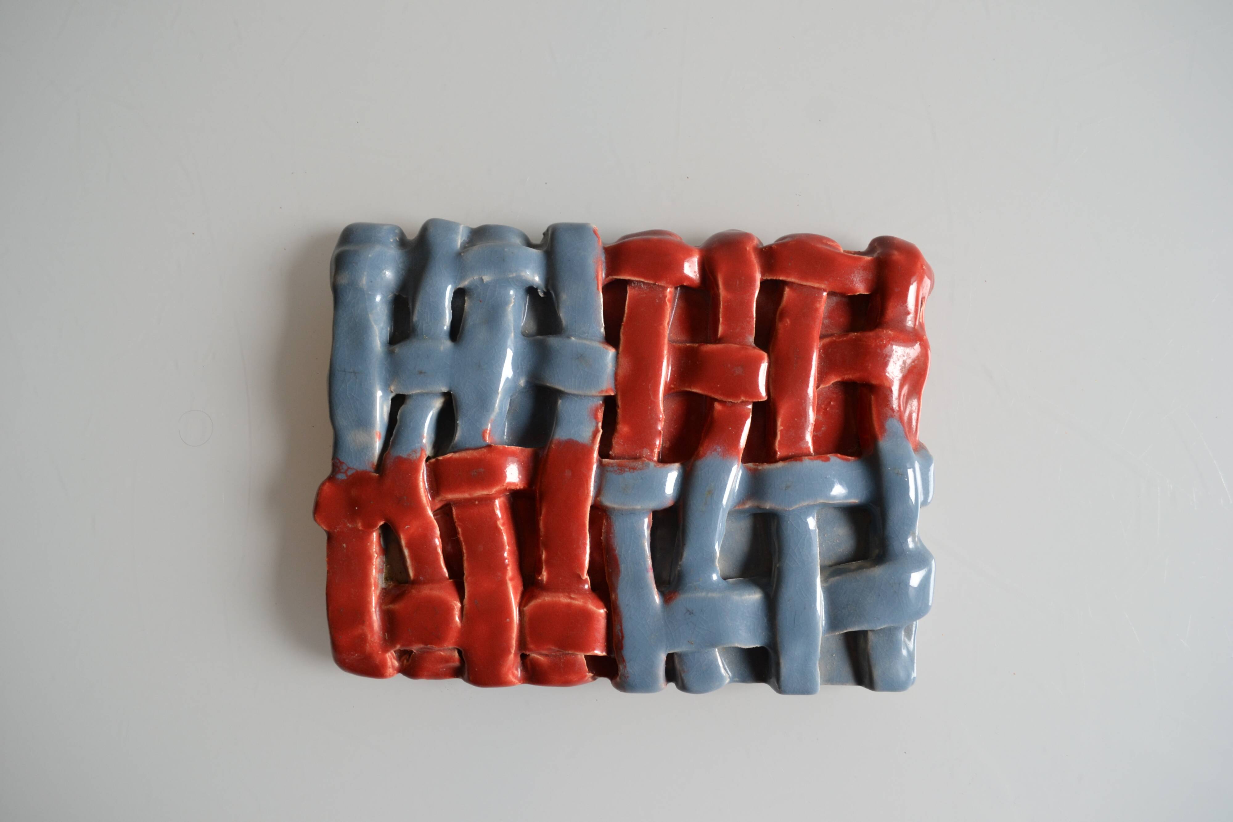 Vintage 1970 woven ceramic rest or trivet