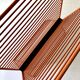 Wire metal magazine rack with triangular compartment, 1950s.
