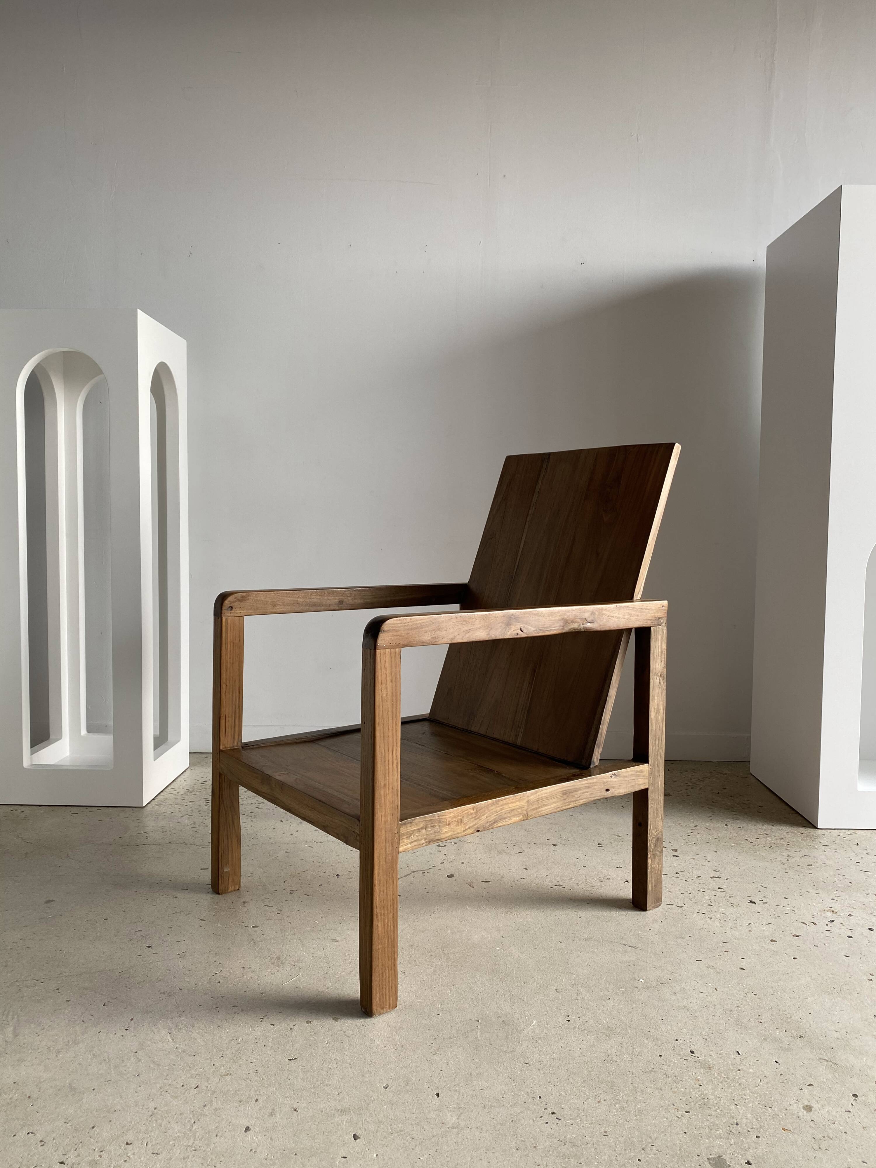 Armchair in natural wood (teak) minimalist design