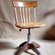Height-adjustable rotating workshop office chair