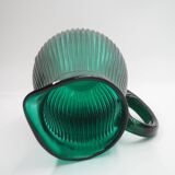 Transparent blue ribbed water jug