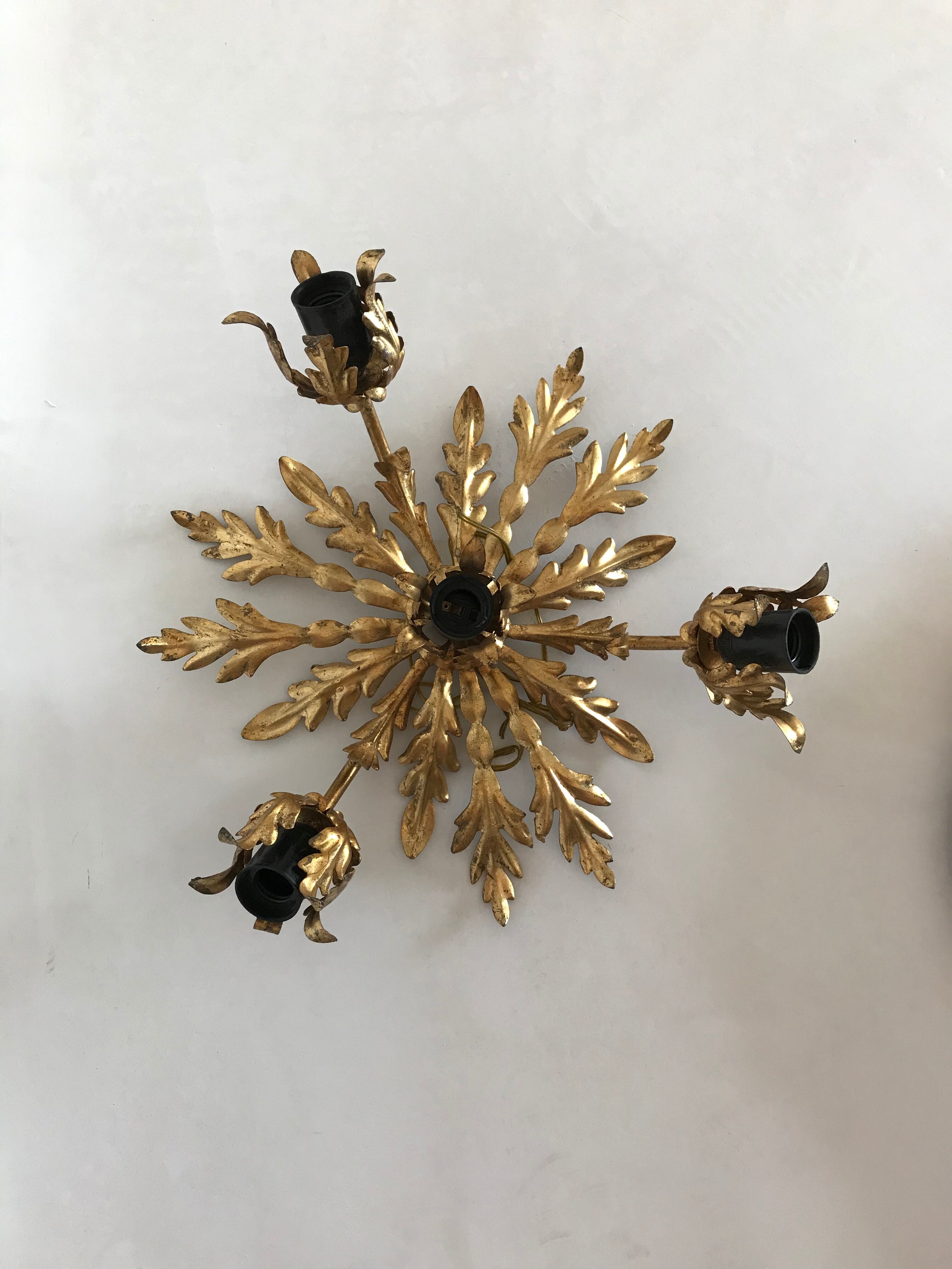 Golden sconce