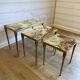 Set of 3 vintage nesting tables in onyx and gold metal from the 1970s.