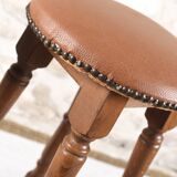 Antique bar stools, brown leather and wood