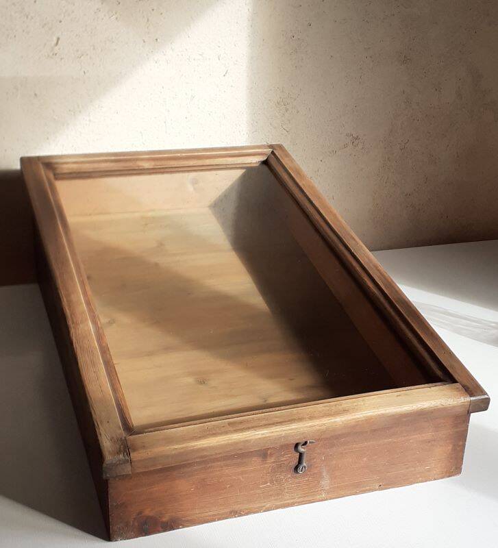 Old sloping pine display case