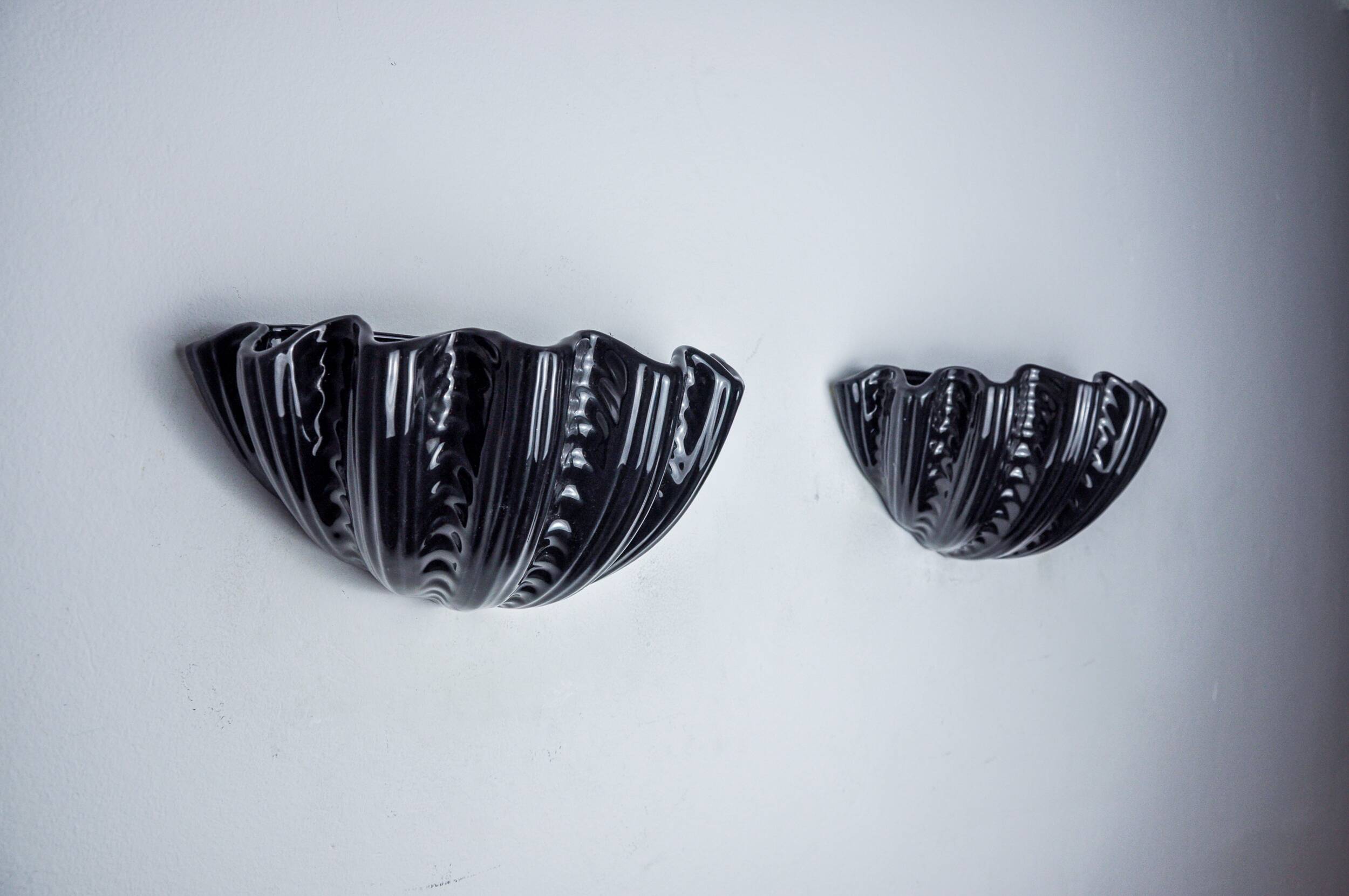 Pair of shell wall lights, black ceramic, Italy, 1970