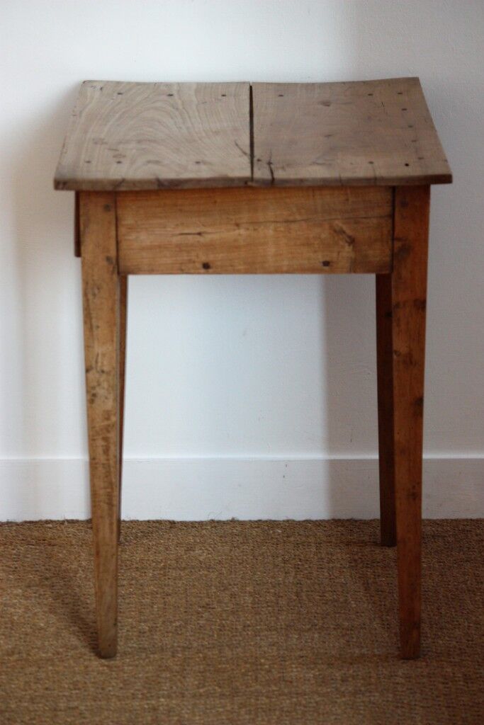 Wooden table with drawer