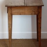 Wooden table with drawer