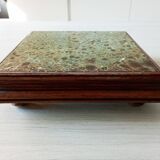 Old wood and ceramic trivet