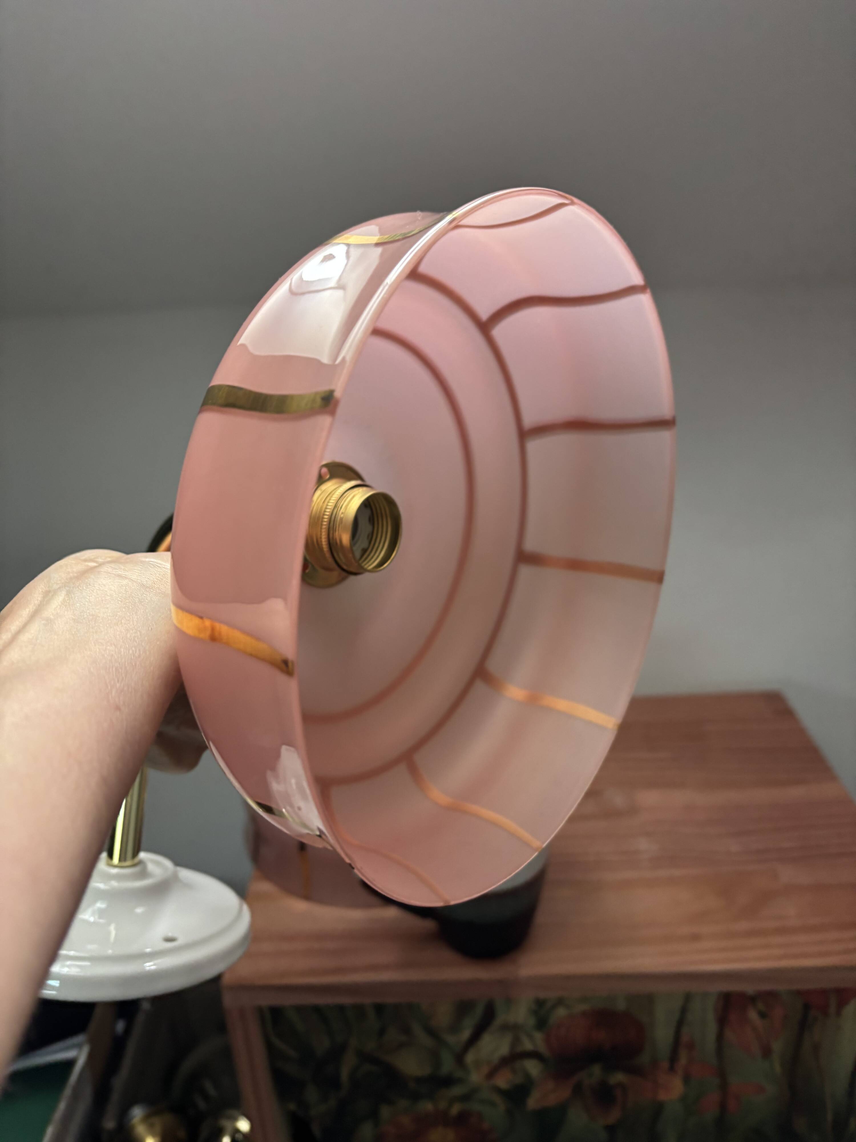 Pair of white ceramic wall lights with pink glass