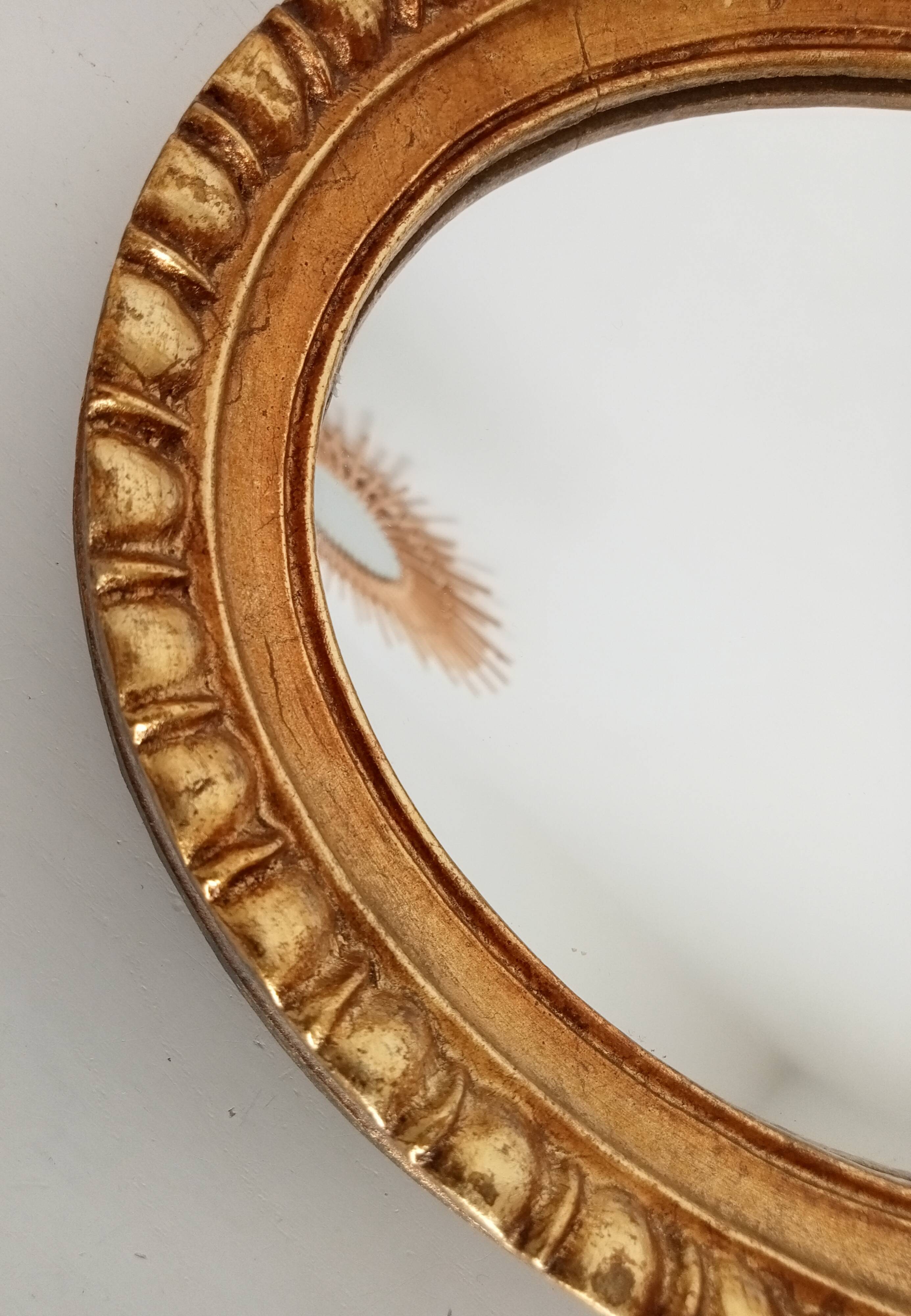 Miroir ovale italien vintage en bois doré