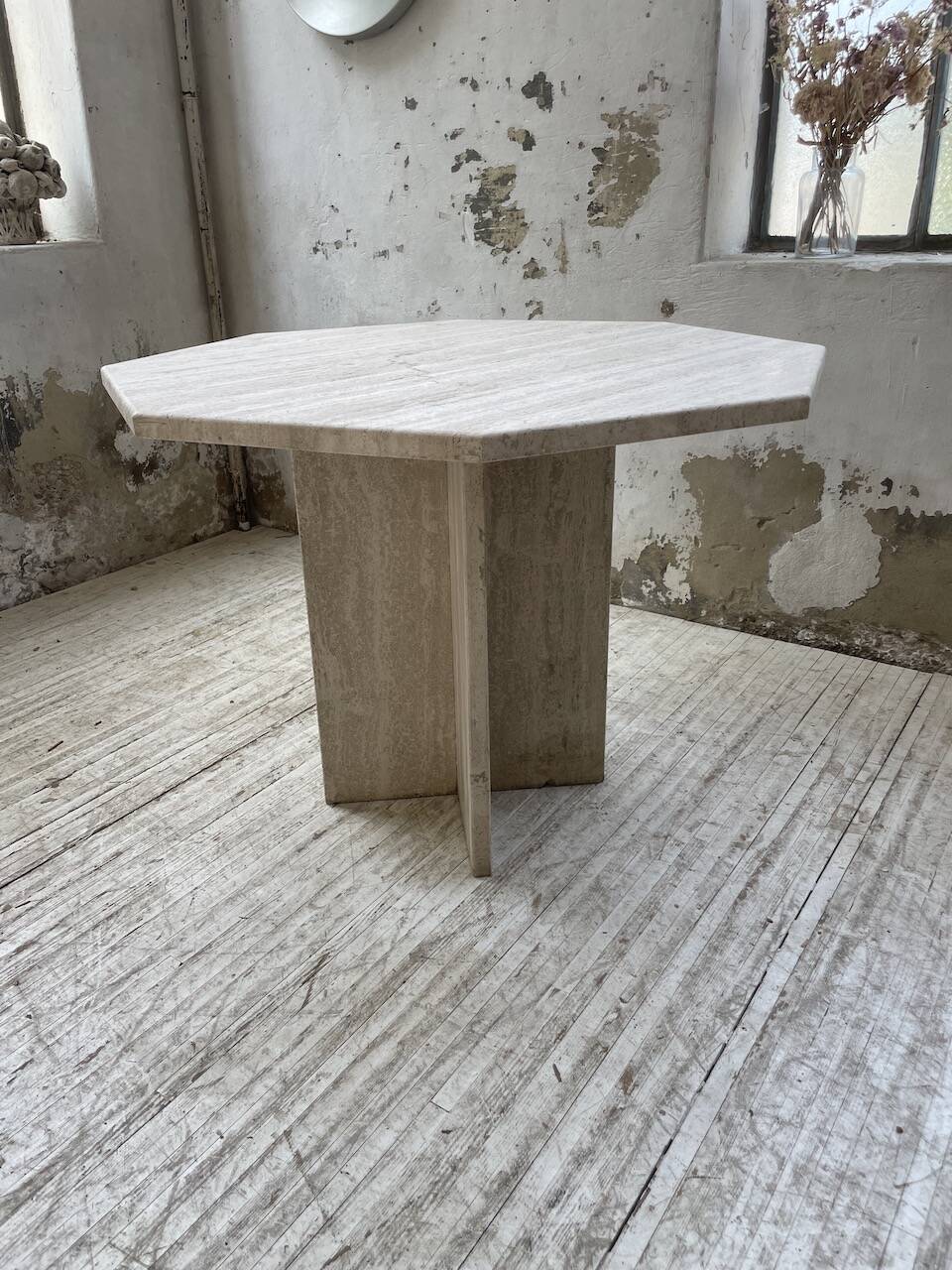 Octagonal travertine coffee table