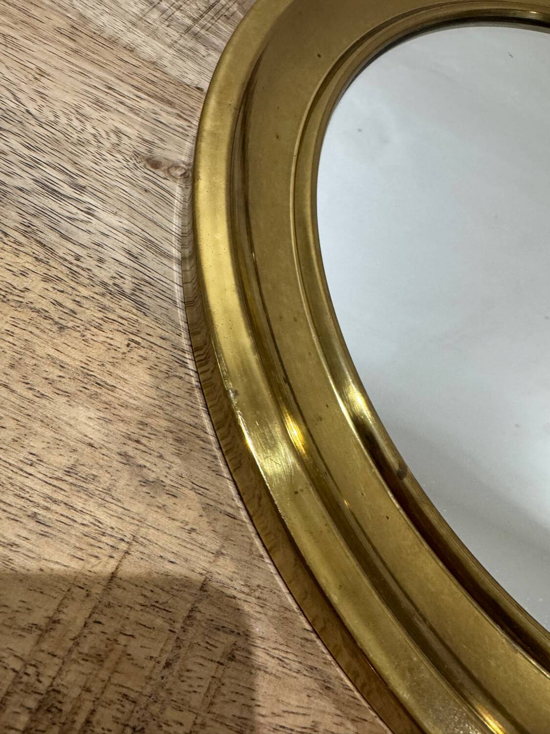 Golden round mirror