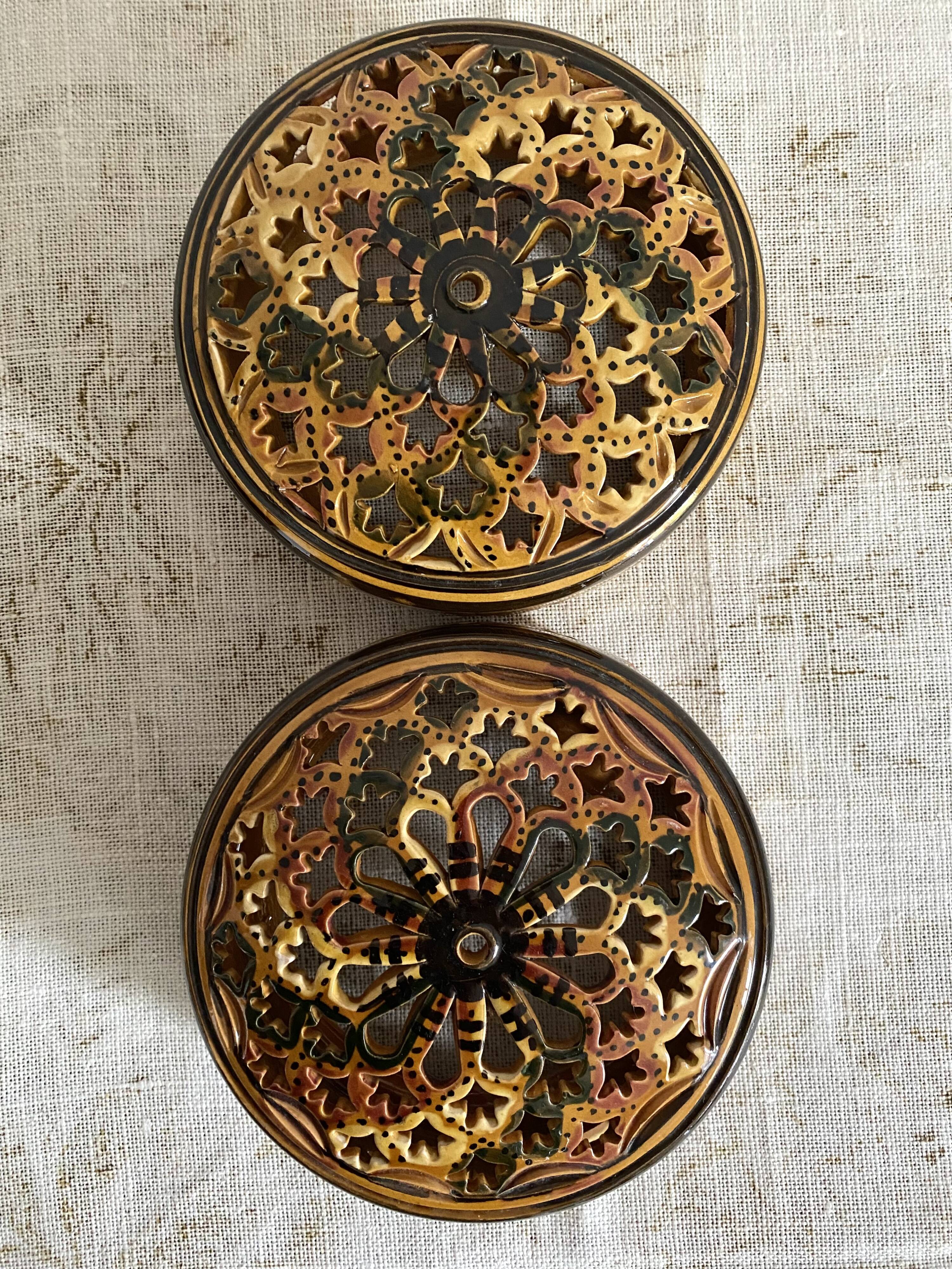 Pair of enamelled terracotta wall lights