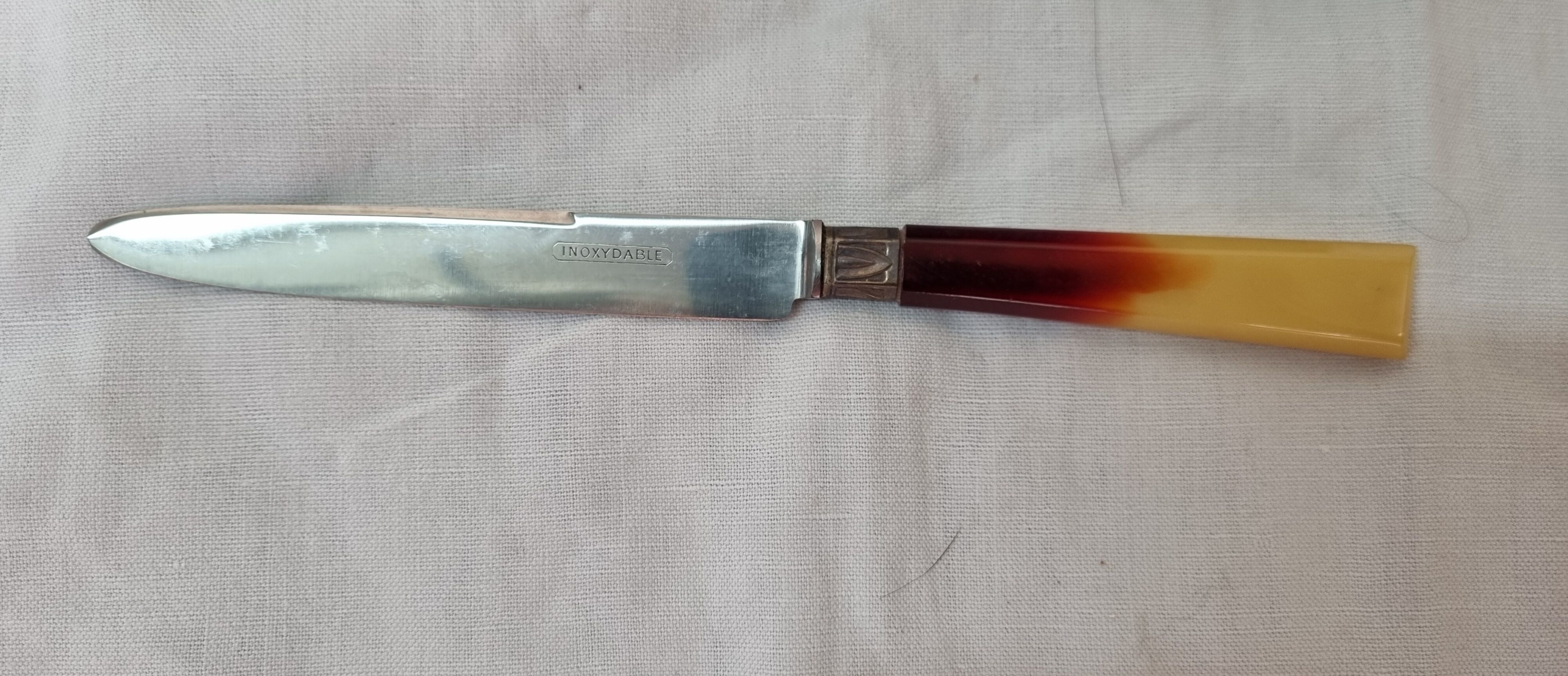 12 couteaux à fromage bakélite 1940