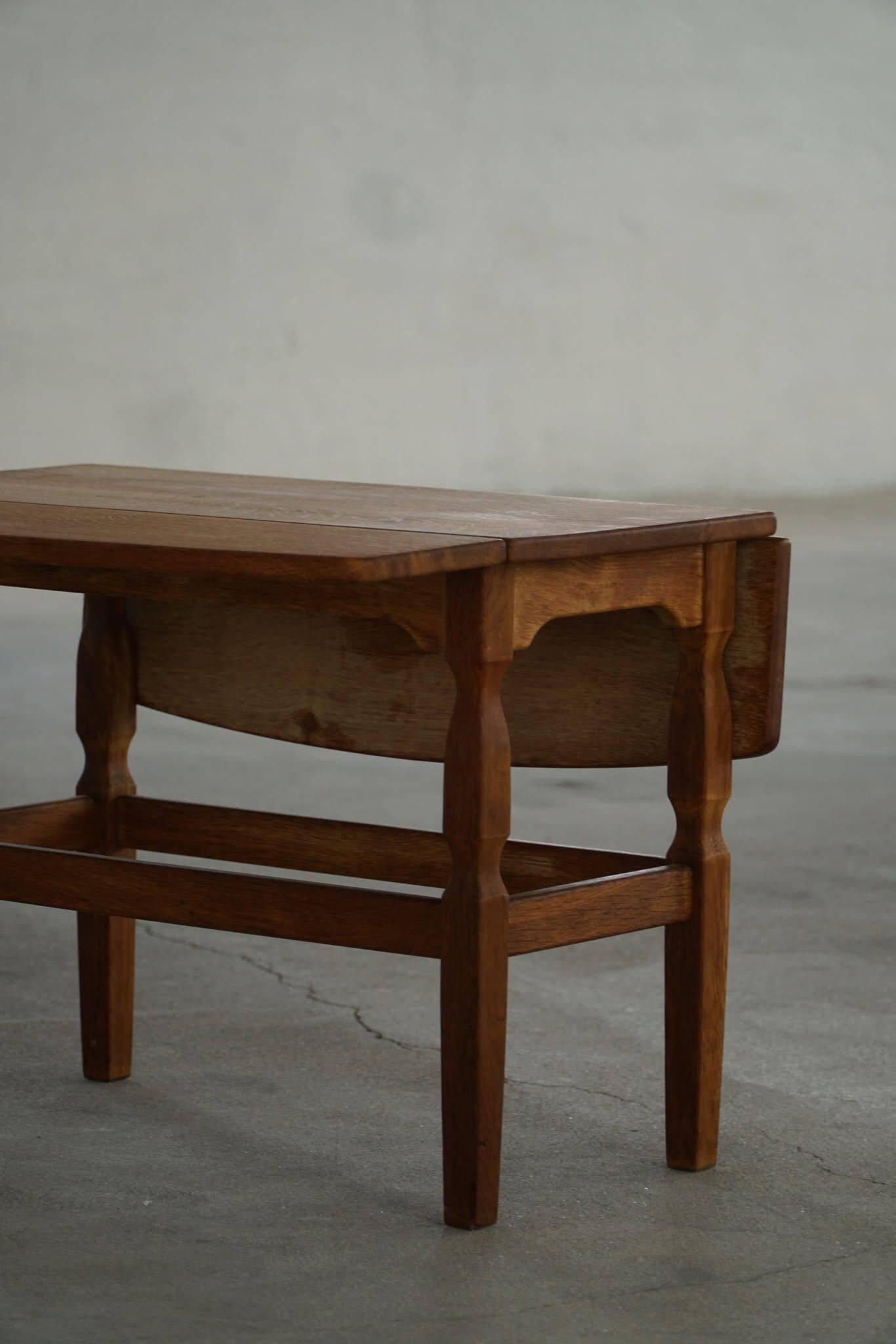 Modern Danish folding side table in solid oak, mid-20th century.