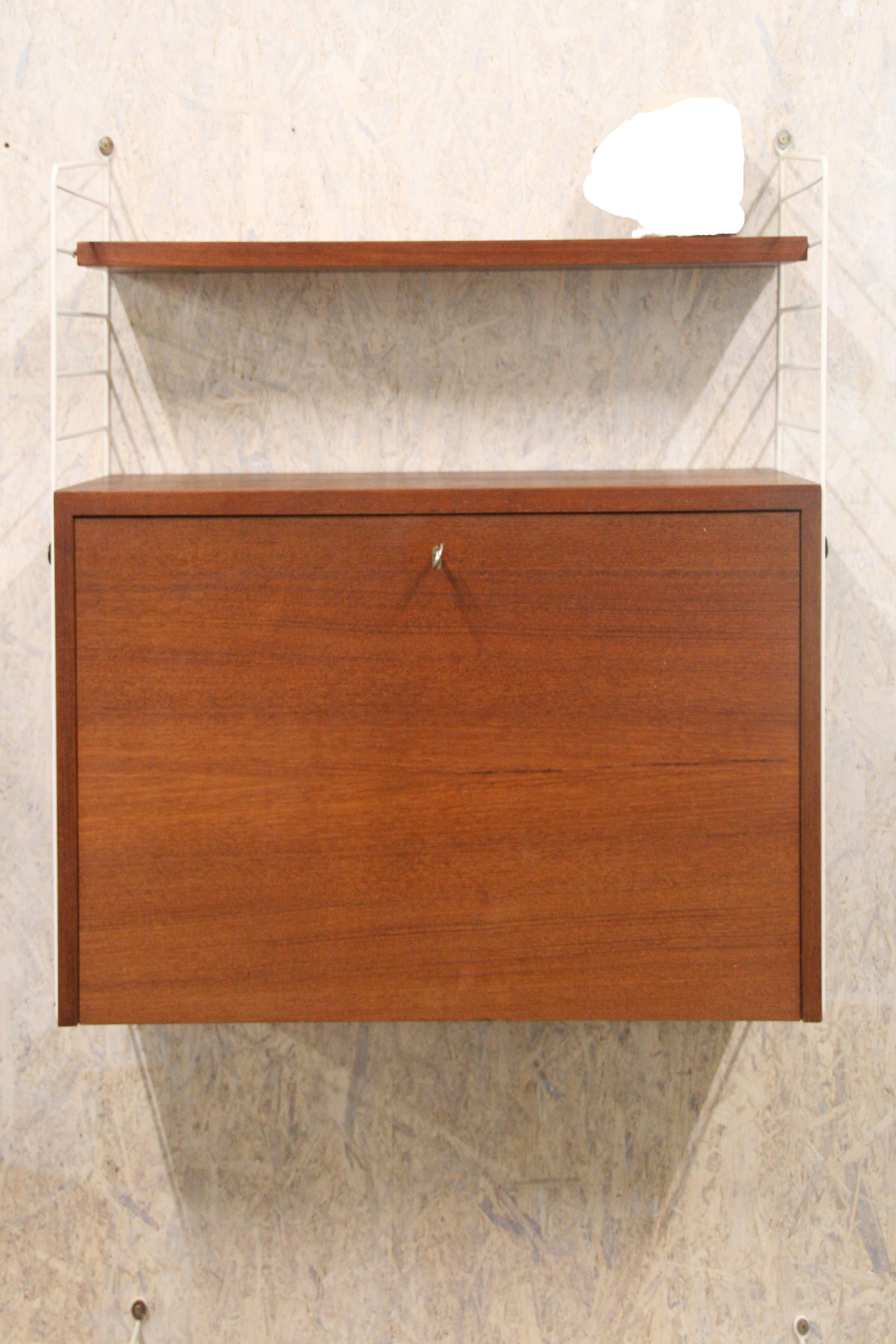 Vintage wall unit/shelving by Nisse Strinning