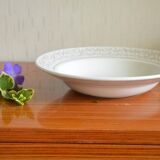 Hollow dish aboard golden flowers