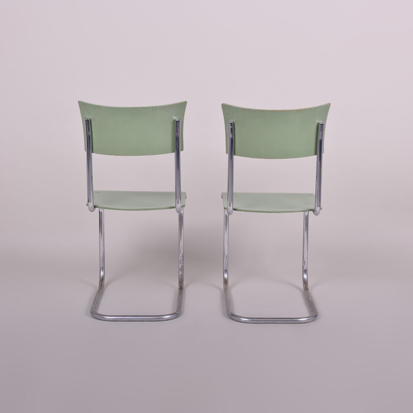 Pair of green Bauhaus chairs made in 1930s Czechia. Made by Robert Slezák