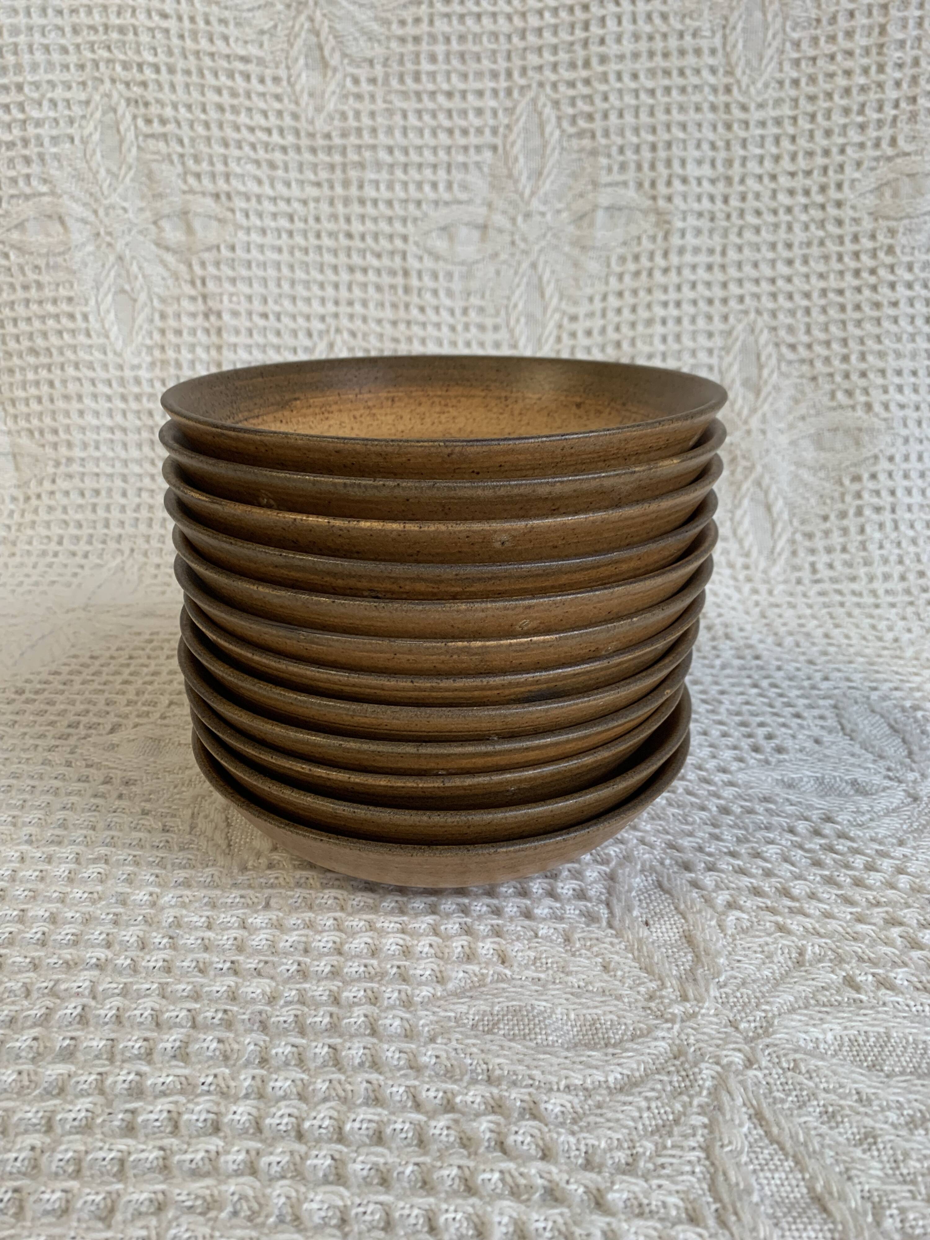 6 Longchamp brown enameled stoneware soup plates, 1970s