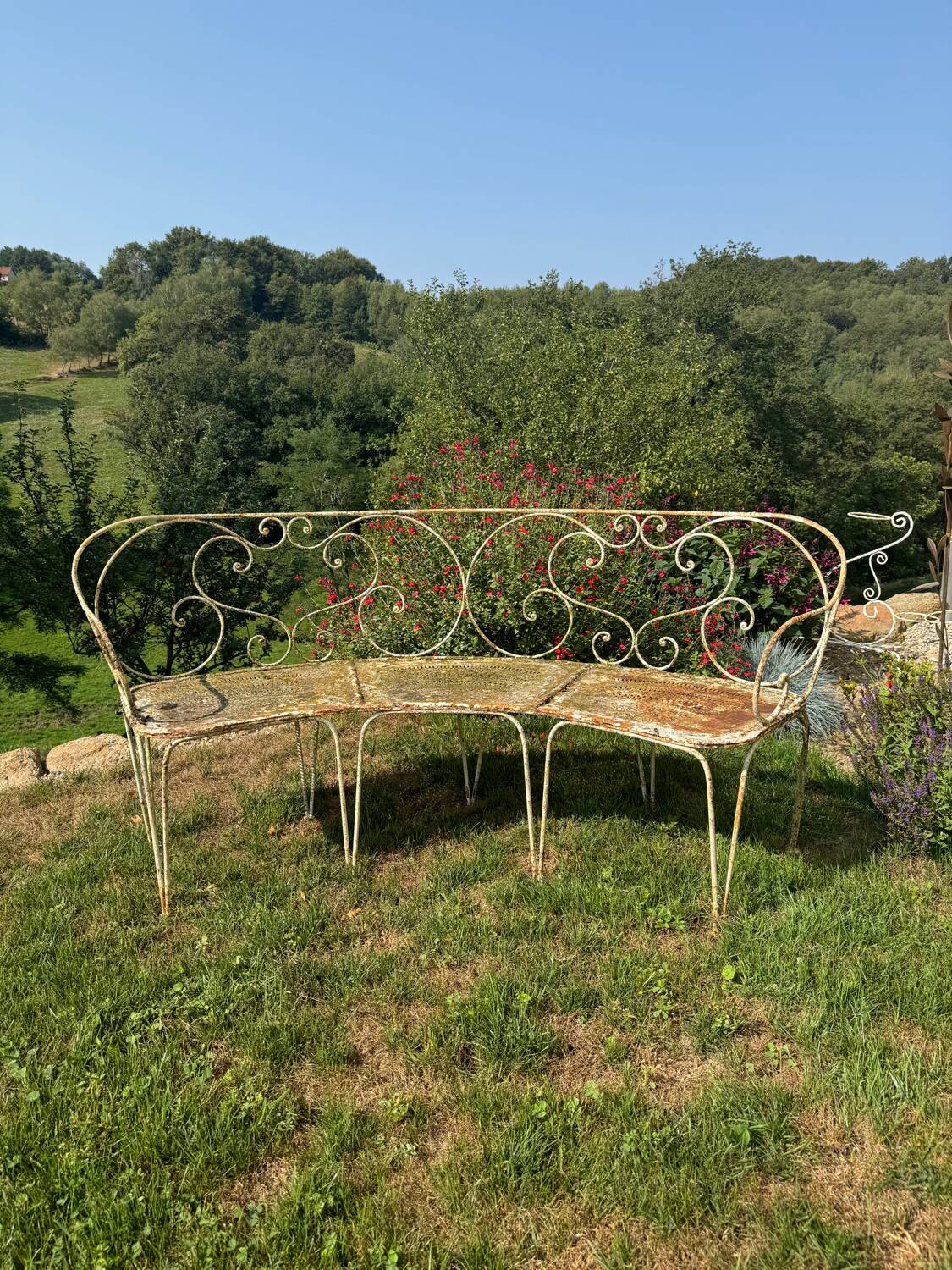 Wrought iron half-moon bench
