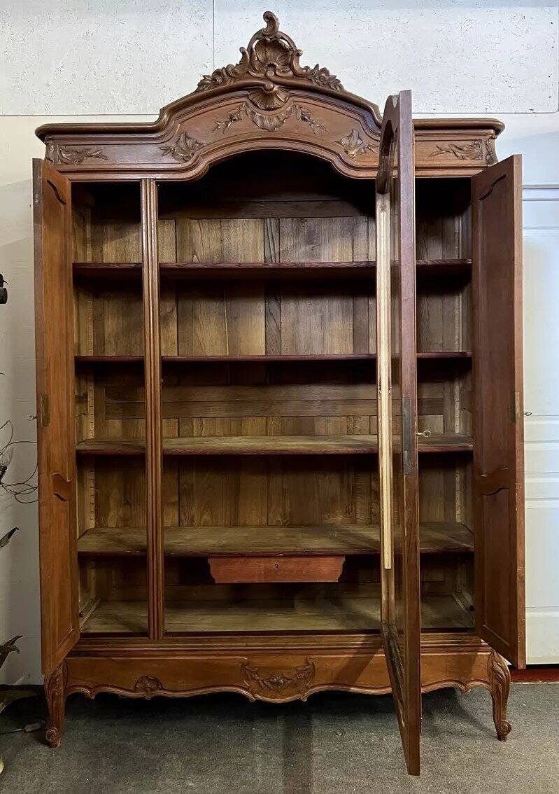 Louis XV rococo style library in carved walnut