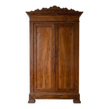 Antique solid walnut wardrobe with two doors.