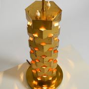 1960s brass table lamp by Vereinigte Werkstätten with an illuminated base