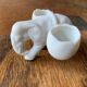 Small elephant in biscuit porcelain, 19th century salt cellars