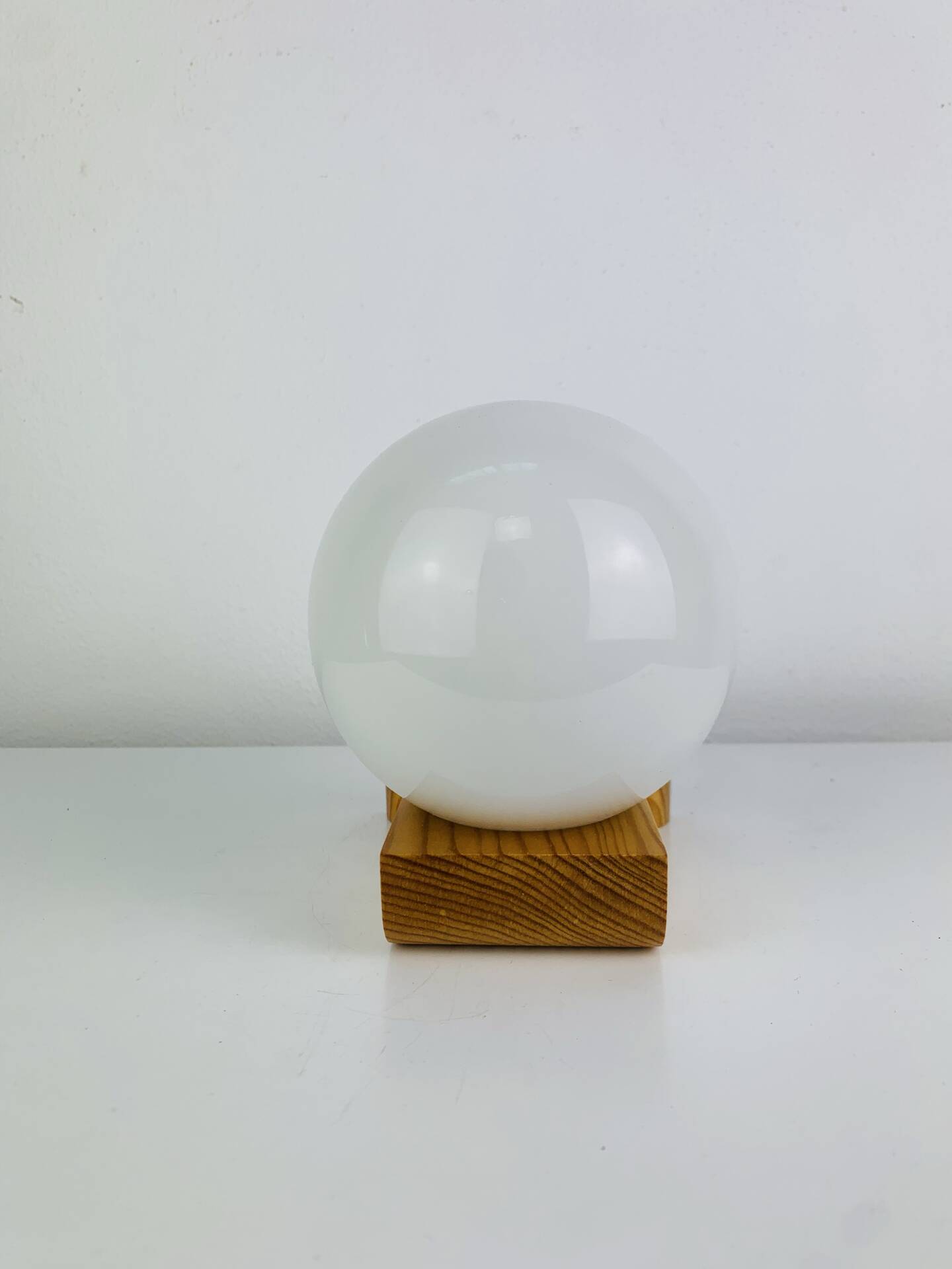 Vintage Tissot opaline globe and pin wall light.