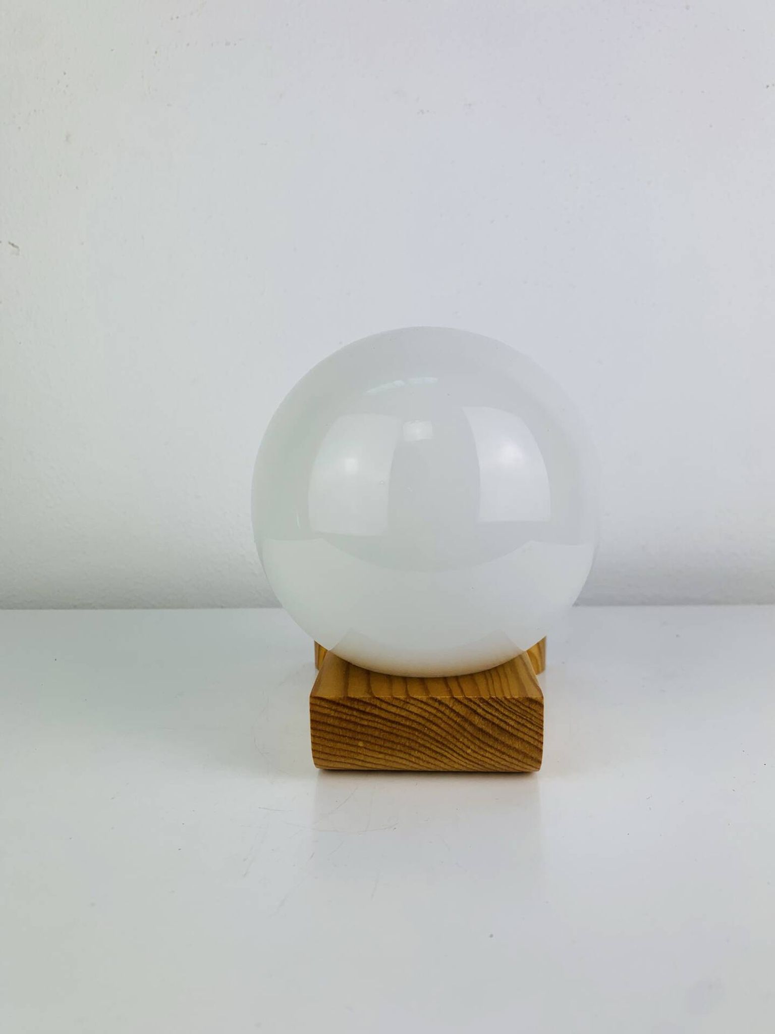 Vintage Tissot opaline globe and pin wall light.