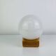Vintage Tissot opaline globe and pin wall light.