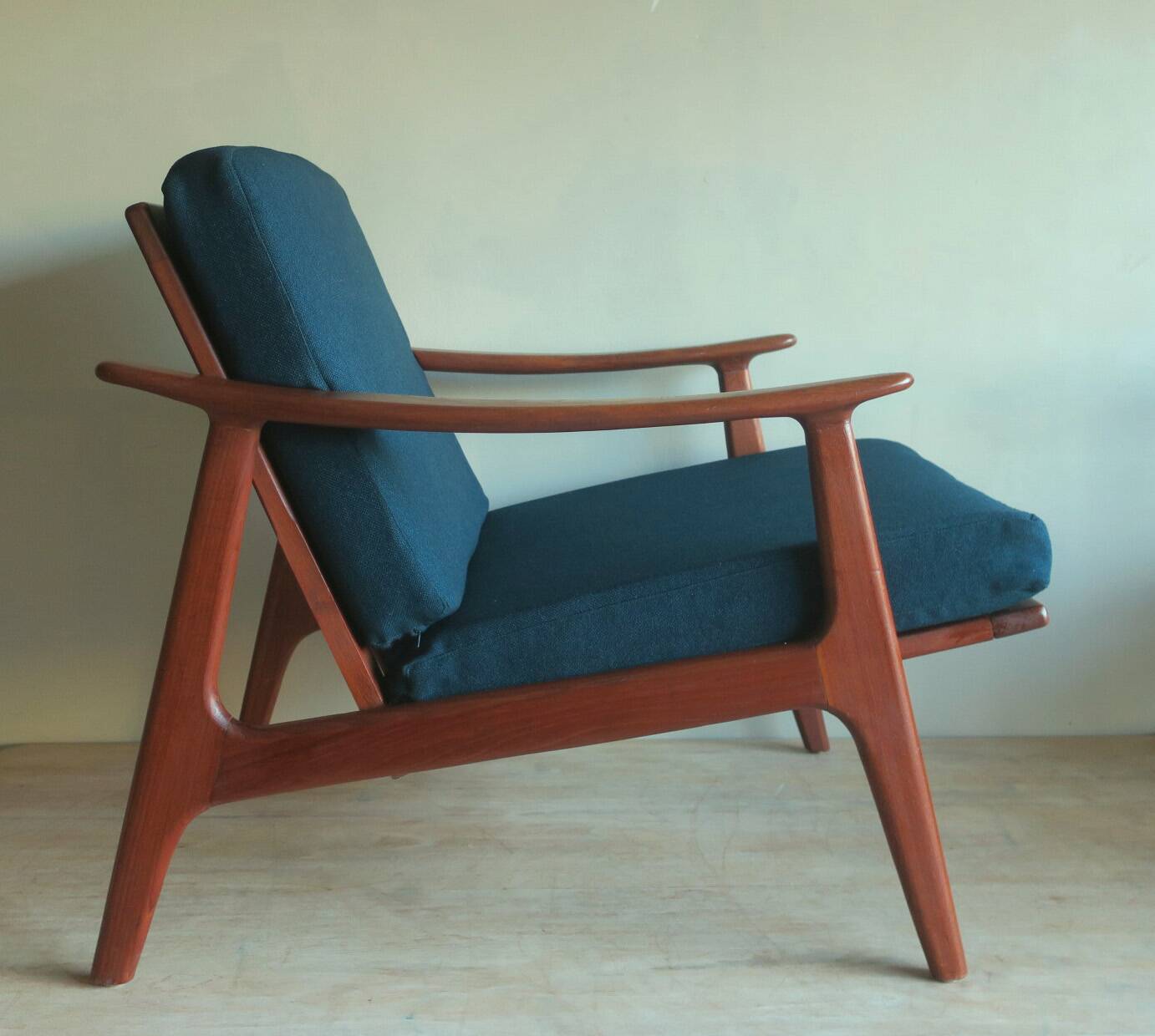 Danish teak lounge chair with blue-green cushions, 1960s
