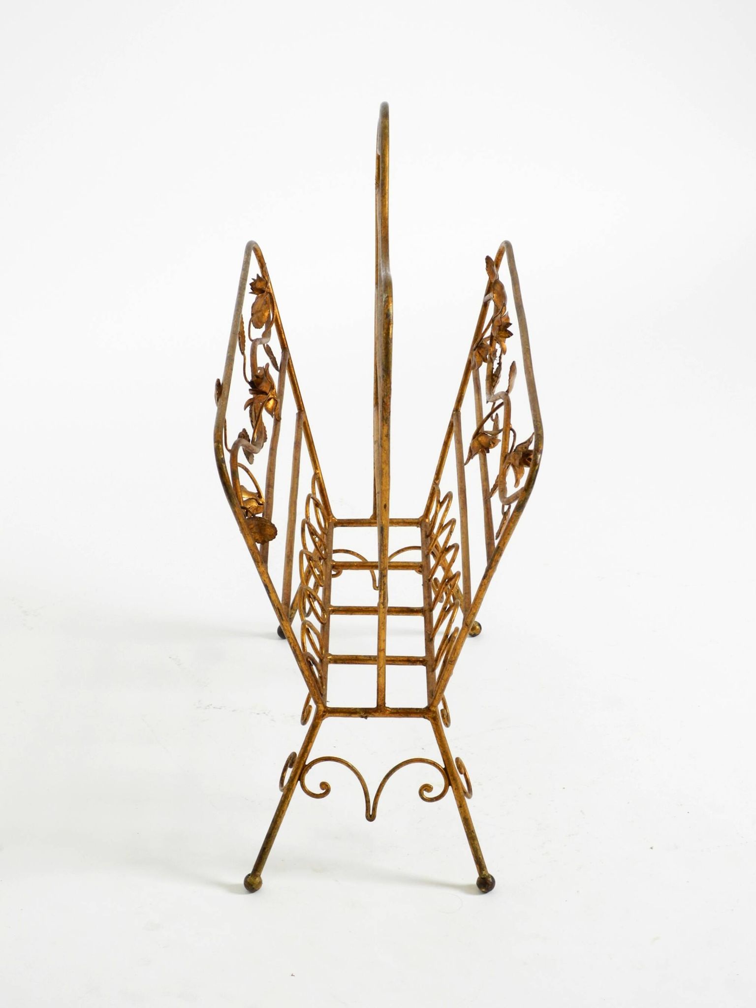 Extraordinary mid-century newspaper and magazine rack with a gilded metal