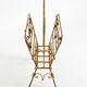 Extraordinary mid-century newspaper and magazine rack with a gilded metal