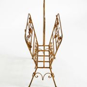 Extraordinary mid-century newspaper and magazine rack with a gilded metal